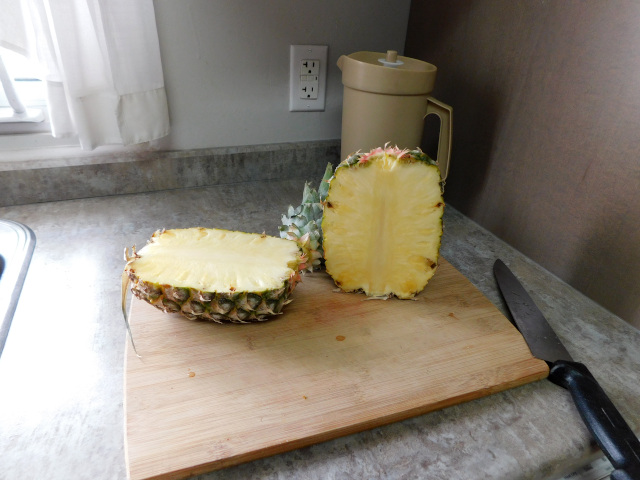 Two photos of a pineapple in the early stages of being cut up.